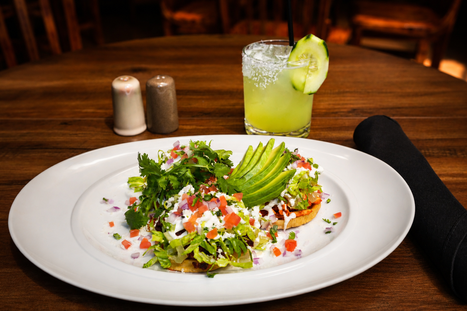 Avocado tostadas with a lime margarita